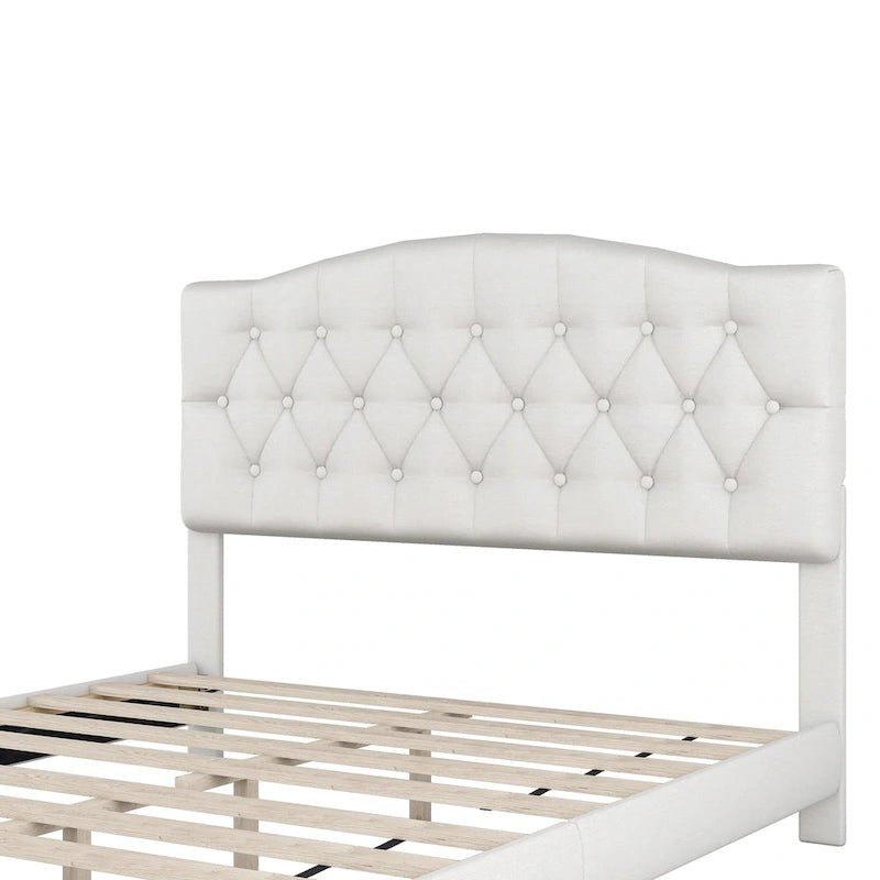 Cama de plataforma tapizada con cabecero curvado tipo silla de montar y detalles capitoné en forma de diamante
